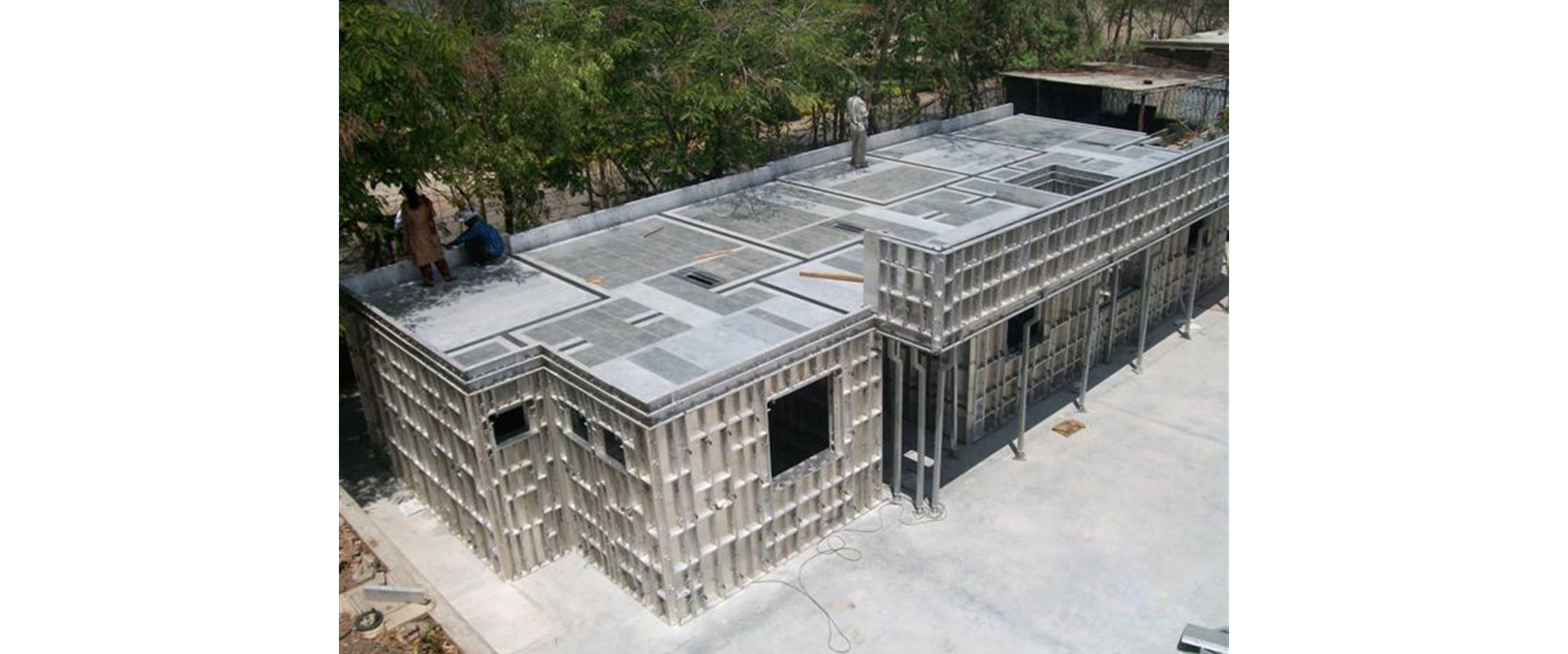Assembled aluminum wall and slab formwork at a construction site