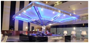 Illuminated glass pergola at Le Meridien Delhi